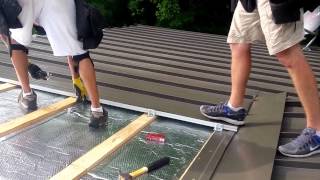 Standing seam roof installation [upl. by Nosiram]