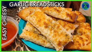 Easy Cheesy Garlic Breadsticks  How to make easy in the oven in 15 minutes  Italian Breadsticks [upl. by Adnael]